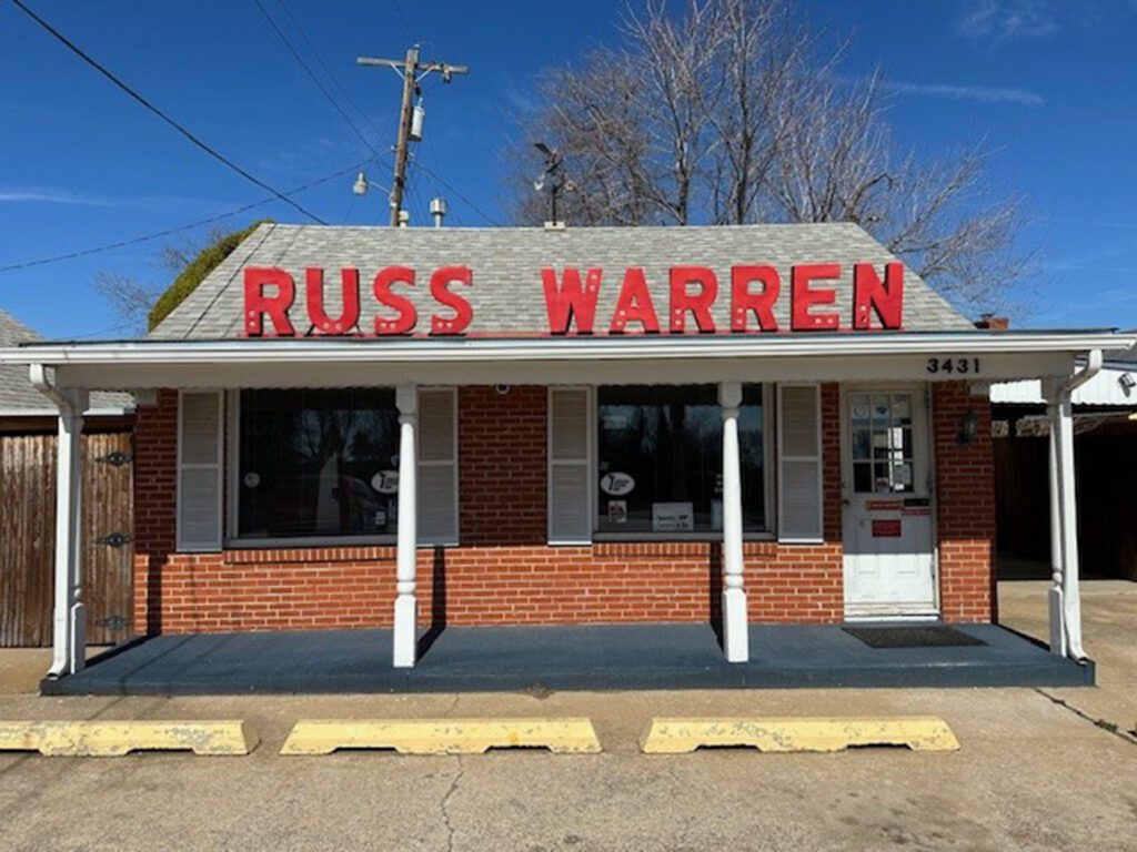 Full banner of front of office of Russ Warren